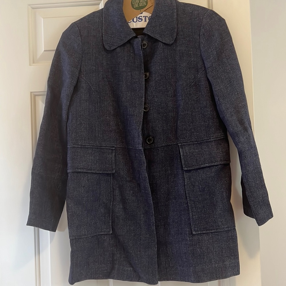 Super flattering denim coat very Chanel meets Bill Cunningham